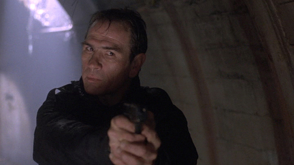 tommy lee jones the fugitive. The Fugitive is a man on the run movie from the moment that bus flips and 